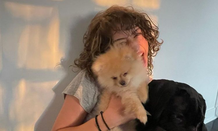 Odessa A'zion with her pet dog.